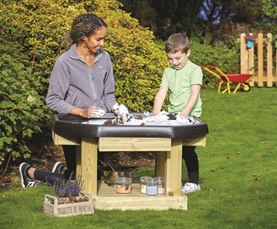 Adult and child using play tray