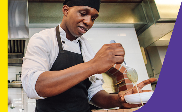 food and catering worker cooking