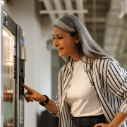 Person using vending machine