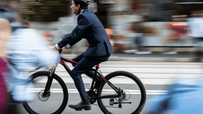 man cycling to work
