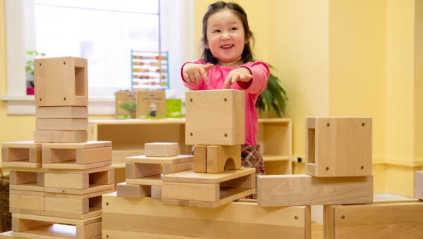 Toddler with construction toys