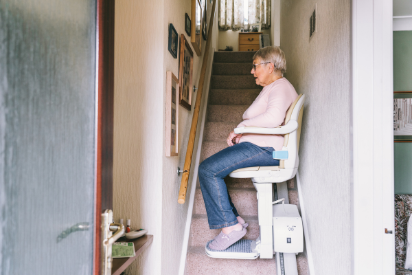 woman using a stairlift