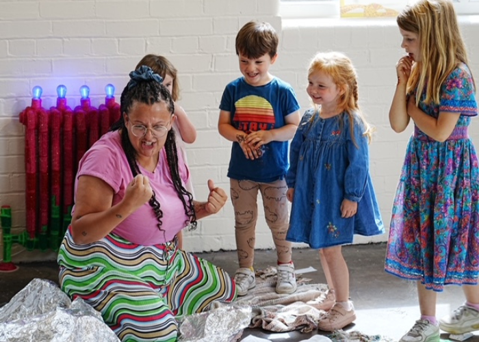 woman storytelling to children