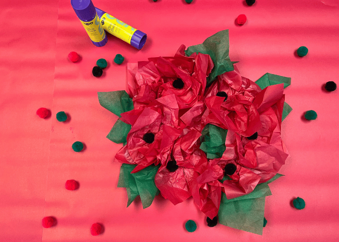 Poppy wreath made from green and red tissue paper