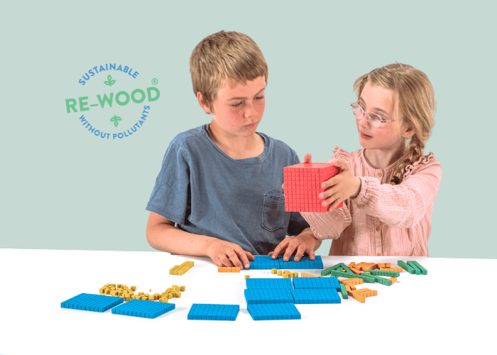 Two children learning with the ReWood Base Ten Set