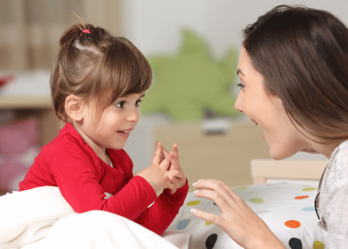 Toddler talking to parent
