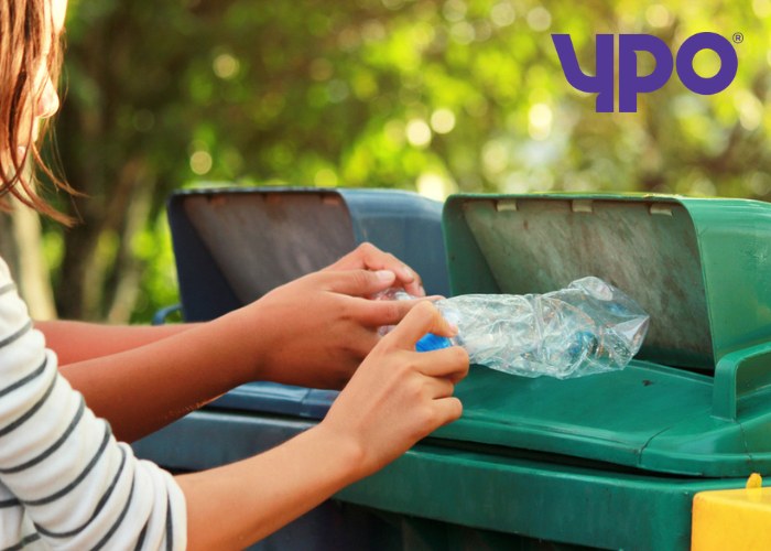 Woman recycling