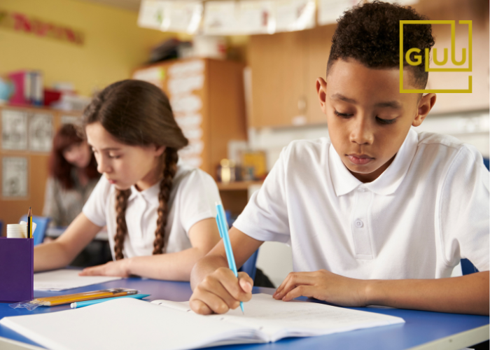 school children at a desk
