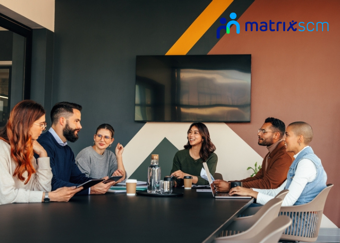 Group of employees in a meeting room 