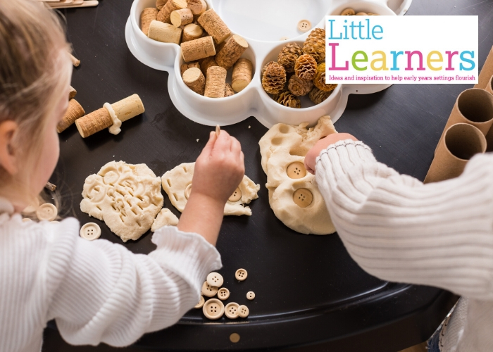 young children playing with loose parts