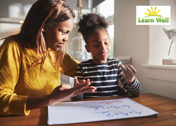 mum teaching maths with child