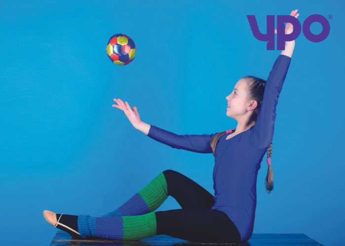 Girl playing with a sports ball