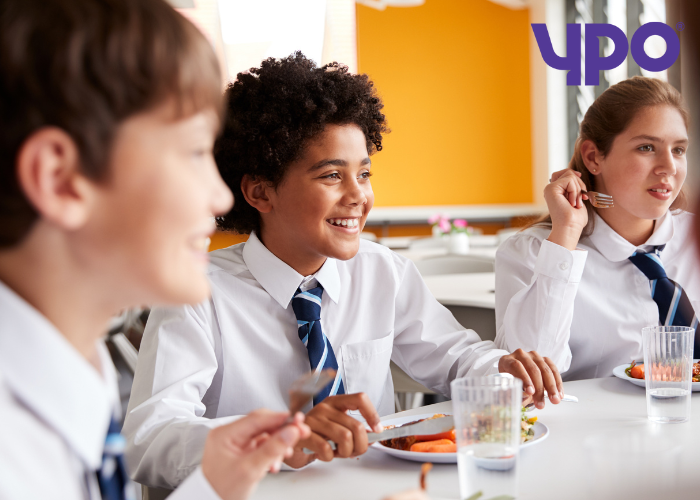 Pupils eating in a school canteen