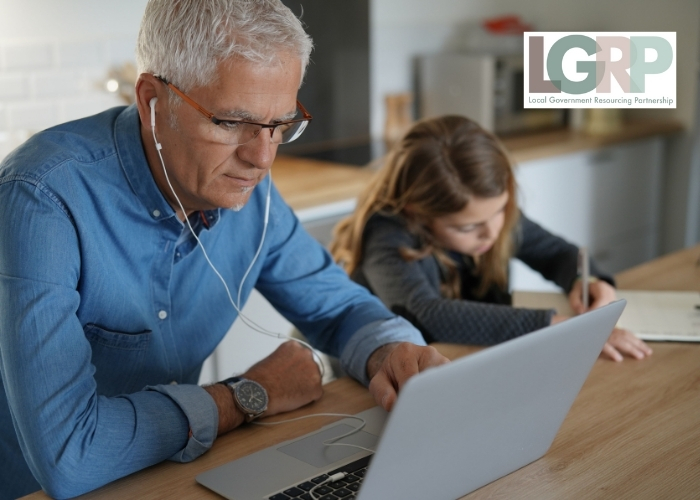 dad working from home with daughter