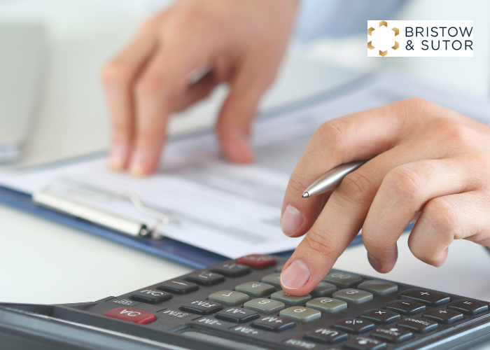Male using calculator