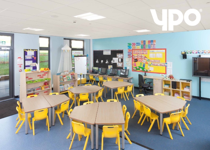 A school classroom with grouped tables and an inclusive layout