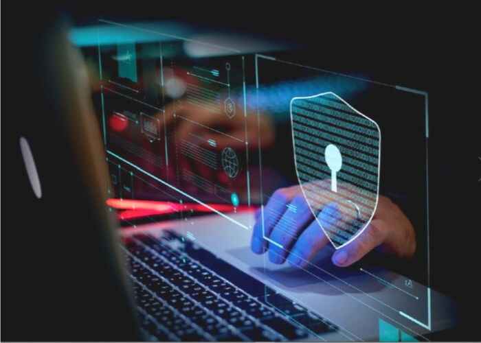hands using laptop