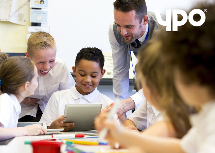teacher and pupils in classroom