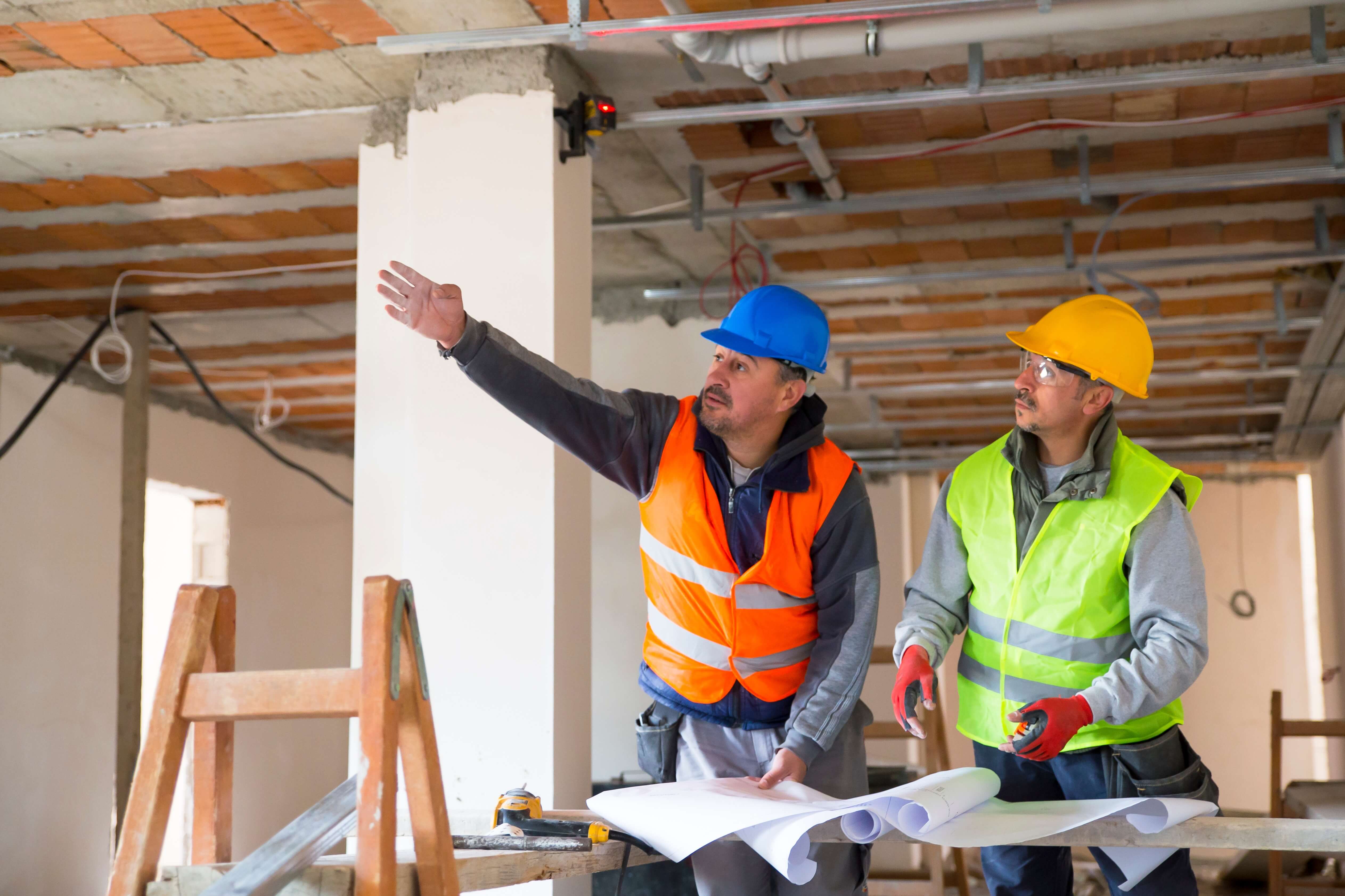 Two builders at work