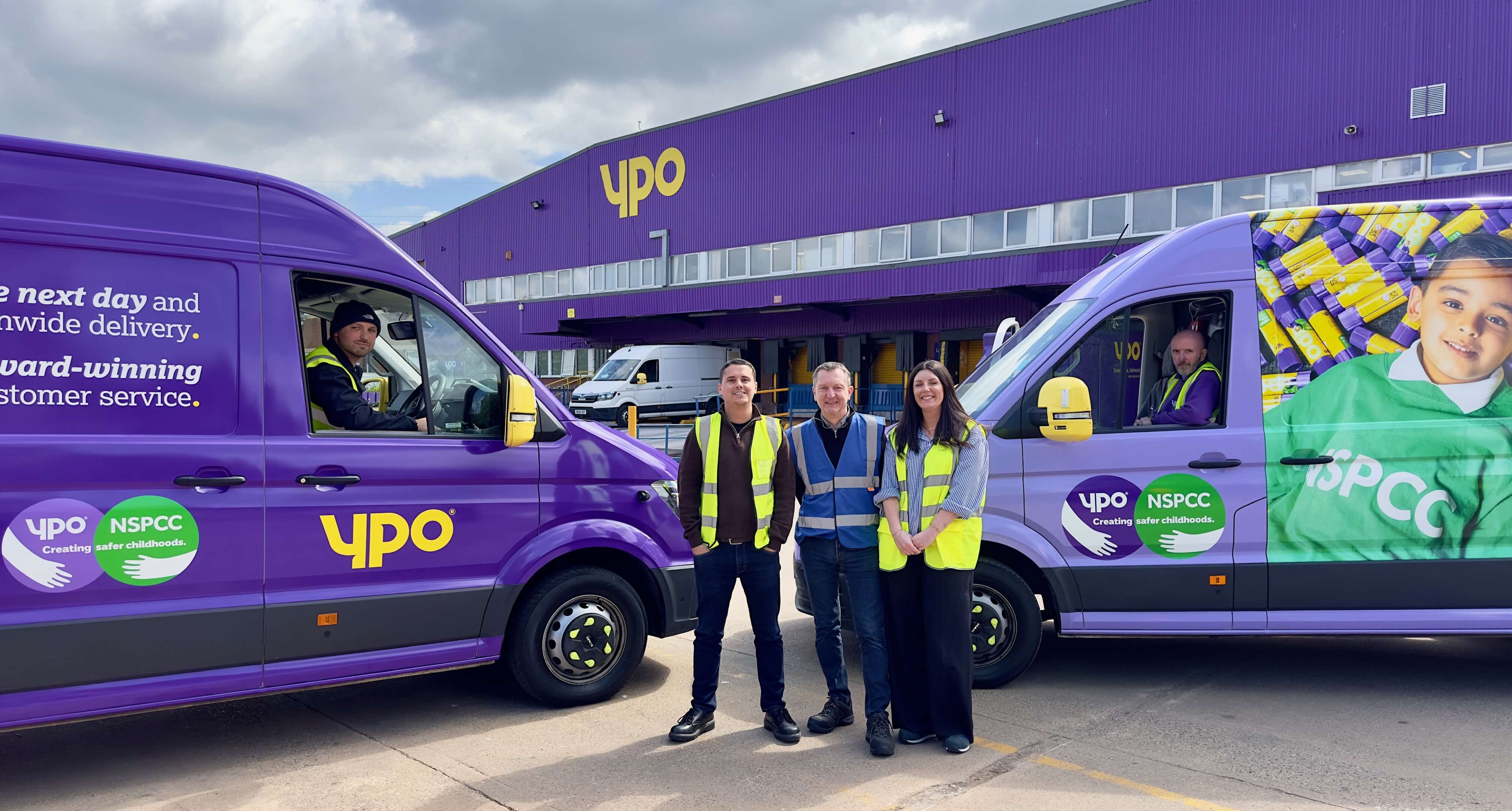 People in front of a van